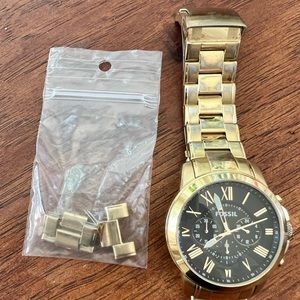 Gold colored fossil watch